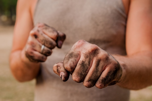 Worker Man with Dirty Hands.