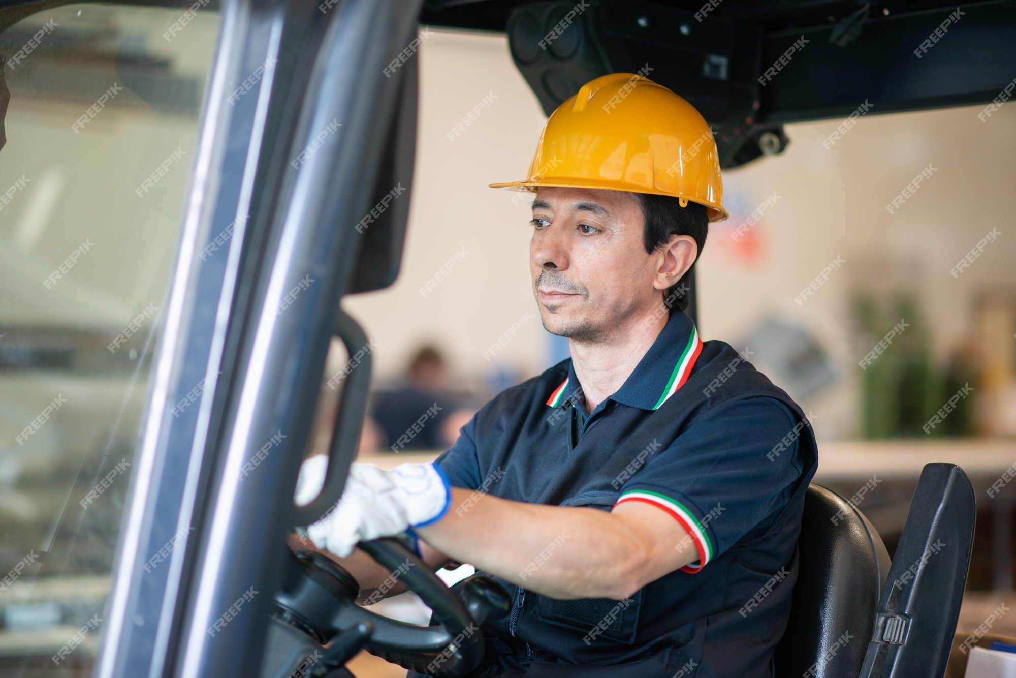 Premium Photo | Worker operating an industrial forklift in a facility