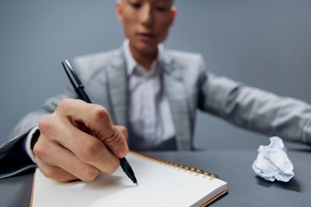 Worker sits in the office emotions nervous breakdown anger\
isolated background