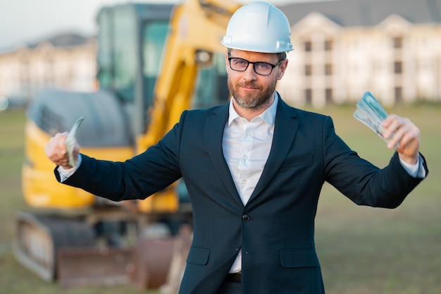 Worker in suit and helmet Investor civil engineer construction manager Construction building