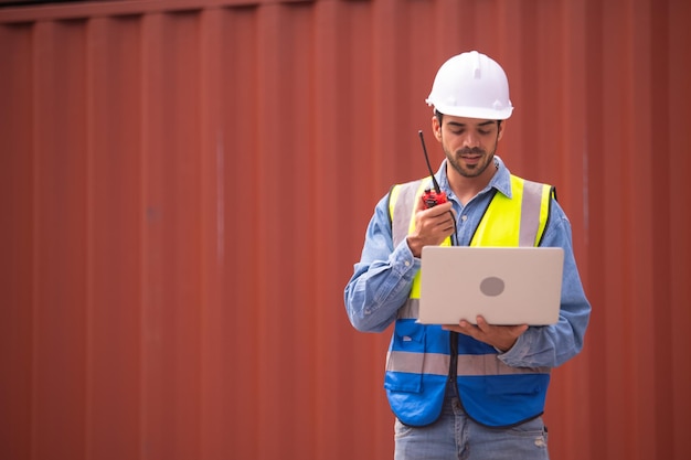 Worker using computer in containers export background engineer using computer in containers import background