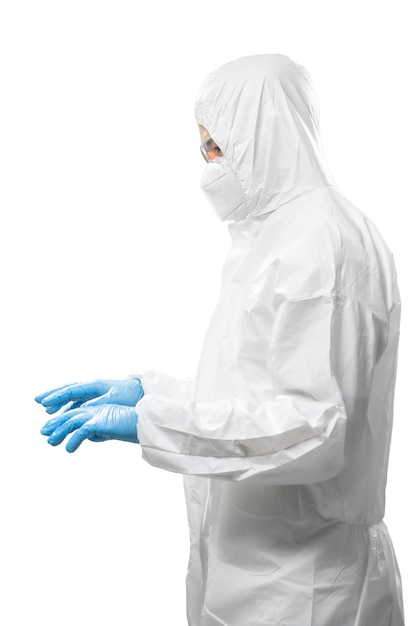 Worker wears medical protective suit or white coverall suit hand typing isolated on white