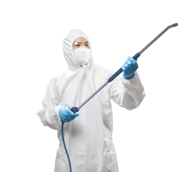 Worker wears medical protective suit or white coverall suit with equipment for spray