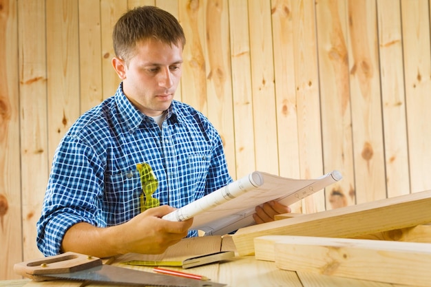 Worker with blueprint