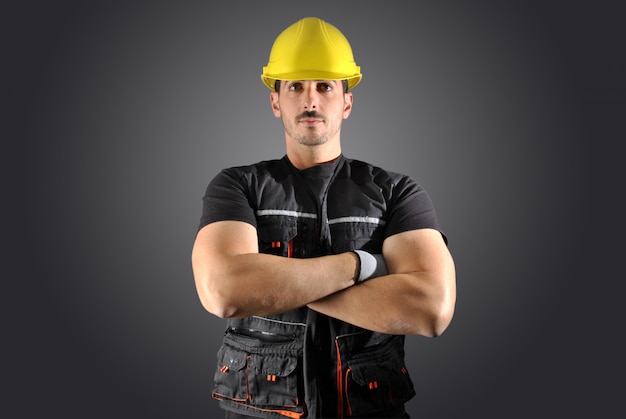 Worker with yellow helmet and face crazy