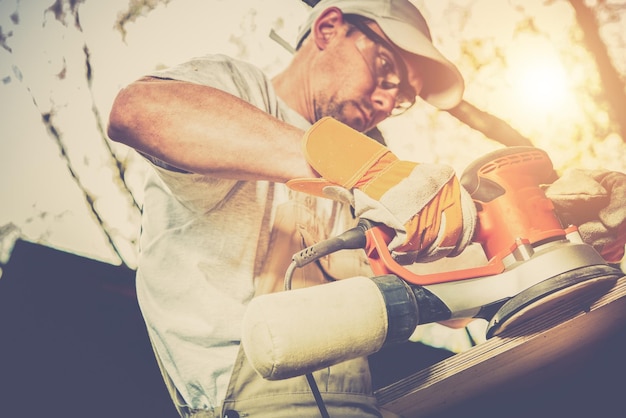 Worker Wood Sanding