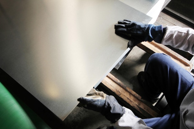 Worker working in metal cutting