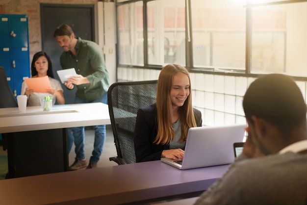 Workers busy working in modern office space