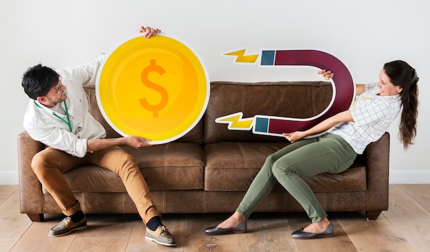 Photo workers holding currency and magnet force icons