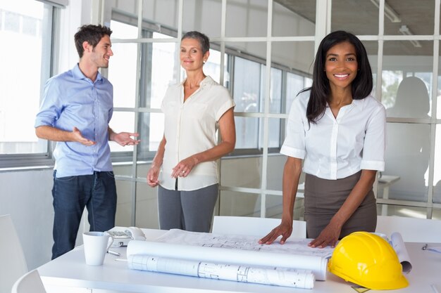 Workers looking at construction plans