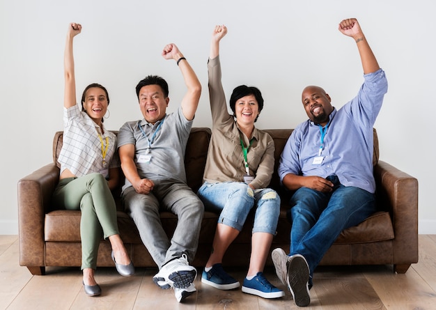 Workers sitting and cheering together