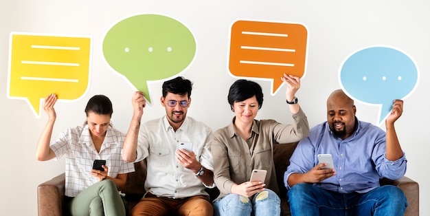 Workers sitting on couch and holding message boxes