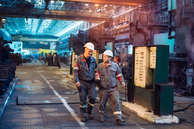 Workers in the steel mill.