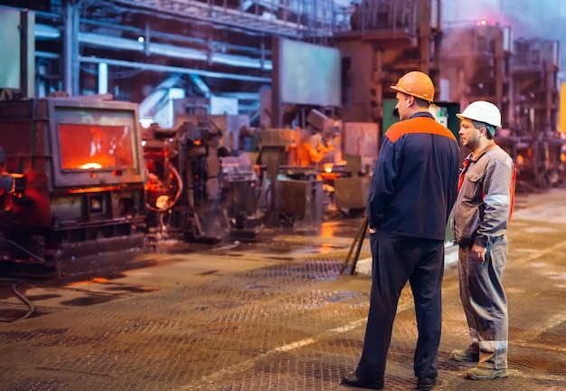 Workers in the steel mill.