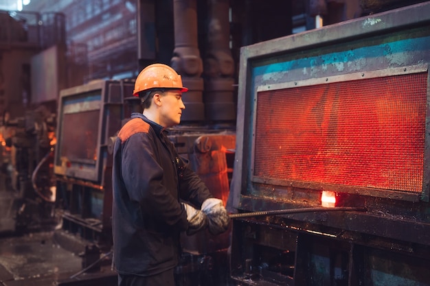 Workers in the steel mill.