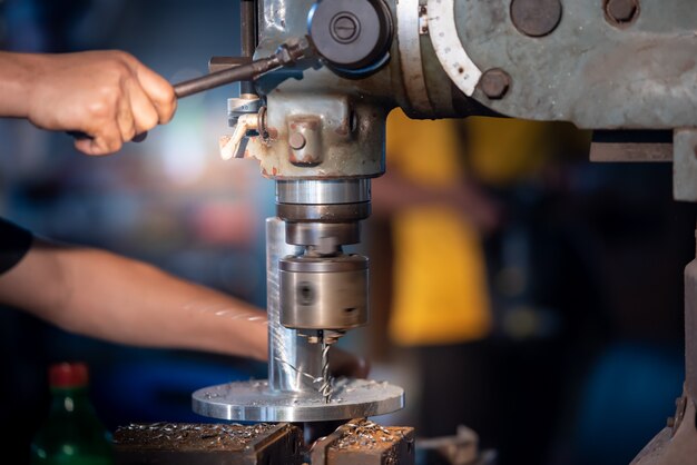 Photo workers use steel drills in lathe shops, rigs and use metal drills in industrial plants to drill metal.