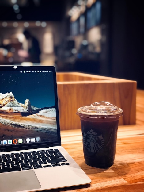 Photo working atmosphere with a cup of coffee