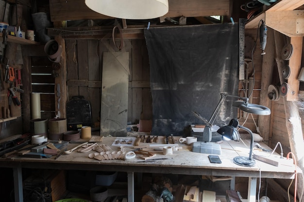 The working desk in wood workshop, wood hand craft. high
quality photo