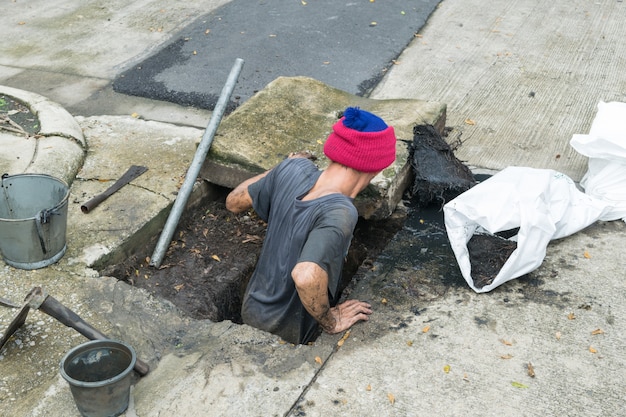 Working for drain cleaning