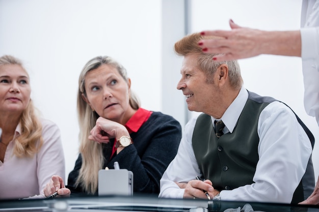 Working group discusses the current tasks at a meeting in the office. business concept