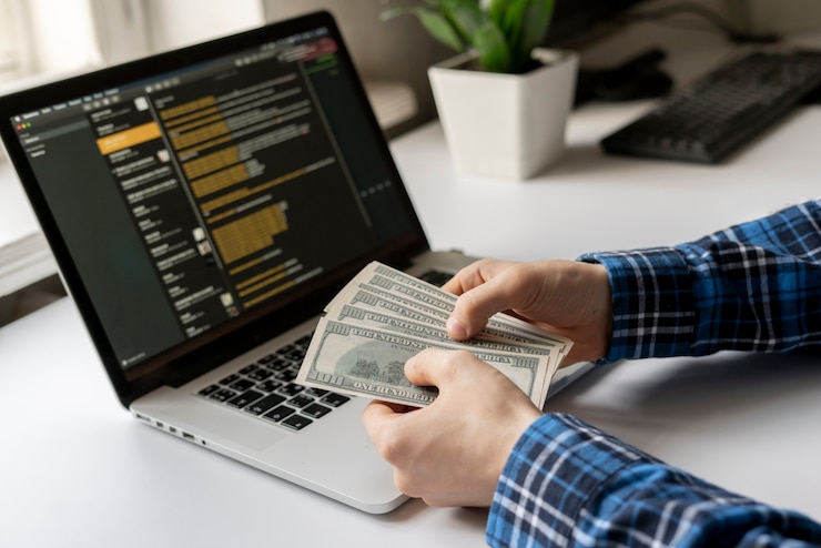 Photo working at home. side hustle, person earned money via computer using the internet
