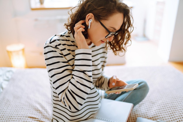 Working online. Female freelancer sitting at home and working on laptop Online shopping in web store