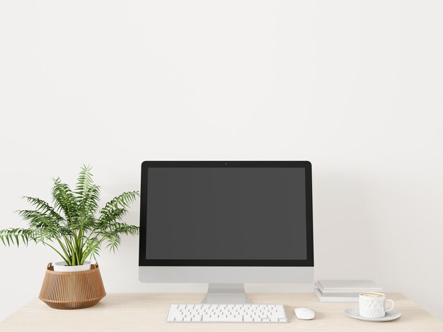 A working room with a computer placed on the table