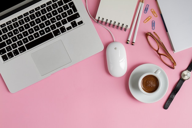 Working Space Business Freelance Concept Top View Above Flat Lay Laptop. Pink Background.