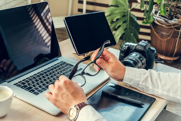 Working table of a photographer close up