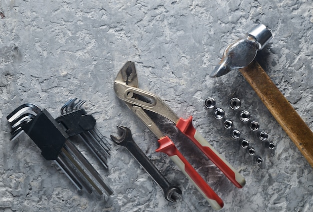 Working tool. Spanners, a hammer, hex keys. Top view, copy space.