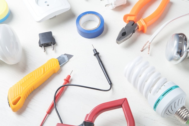 Working tools and components on the white background Electrical objects