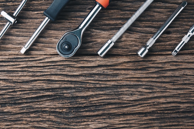 Photo working tools on wooden background. color effect