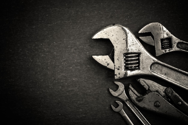 Working tools on wooden table background. top view