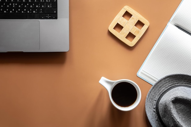 Workplace flat lay minimalist composition with laptop and coffee cup