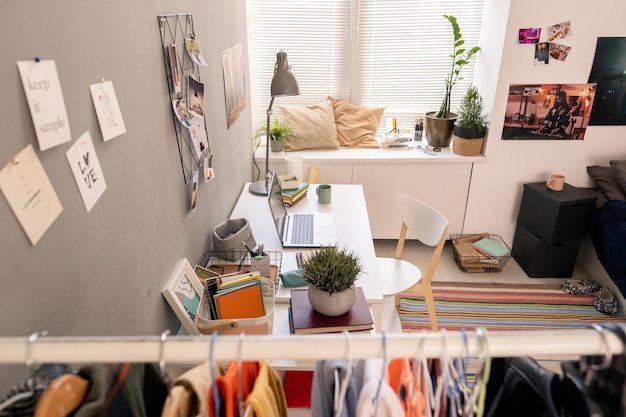 Photo workplace of freelancer or designer in domestic room