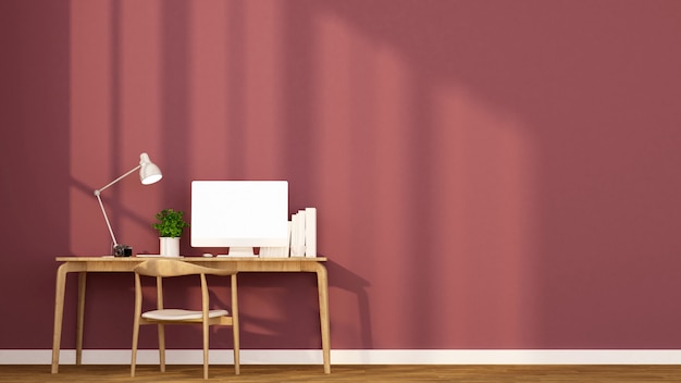 Workplace and red wall in apartment or home.