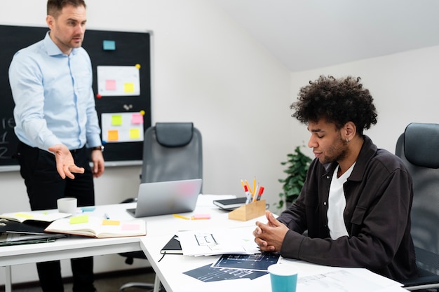 Photo workplace violence taking place between colleagues