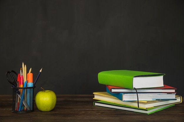 Photo workplace with books and stationery