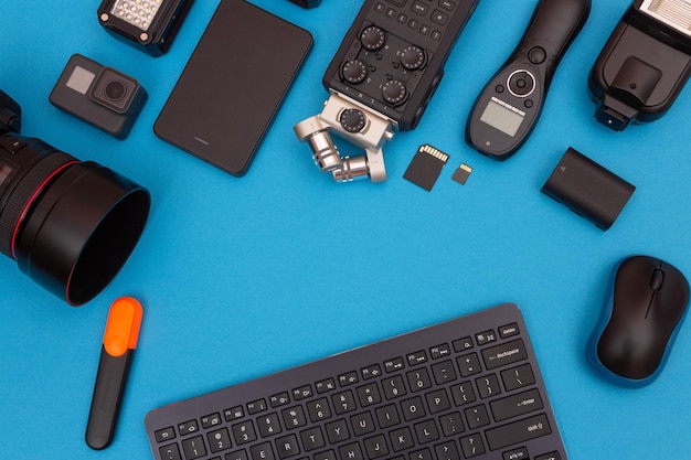 Workplace With Digital Gadgets on Blue Table