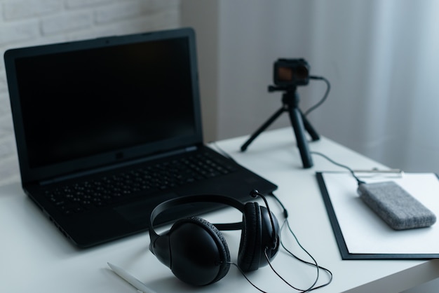 Photo workplace with laptop and headphones