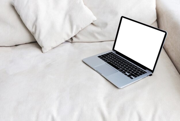 Workplace with laptop on table at home