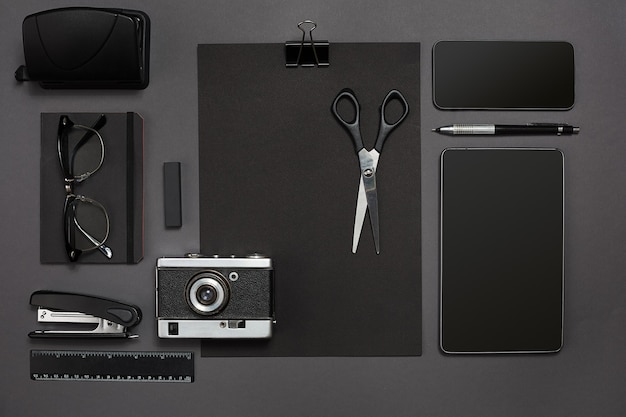 Workplace with office items and business elements on a desk concept for branding top view