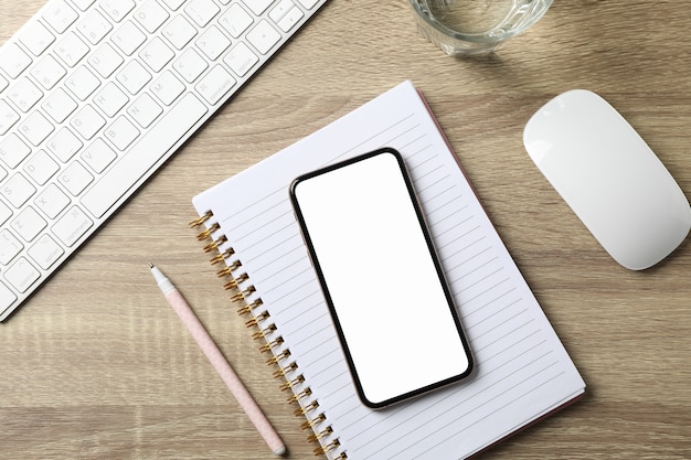Photo workplace with phone with empty screen