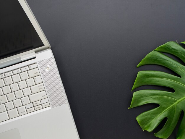 Photo workspace mockup with laptop