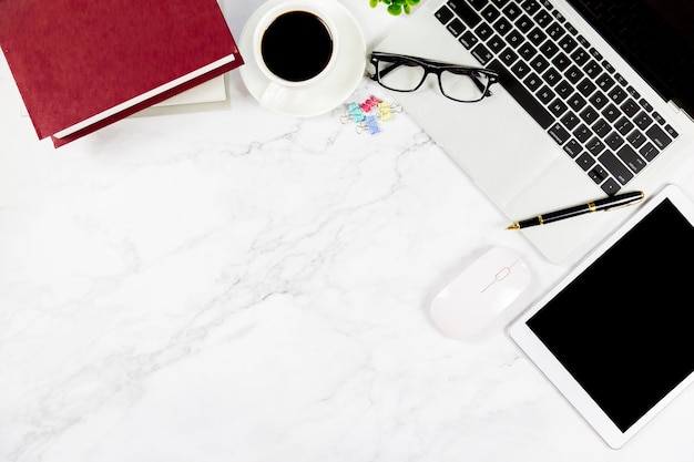 Workspace in office, Marble White desk with blank notebook and other office supplies