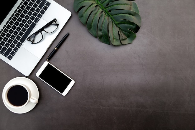 Workspace in office, Wooden White desk with blank notebook and other office supplies