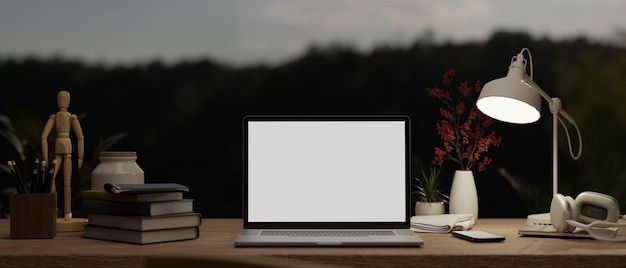 A workspace with laptop mockup table lamp headphones book and decor on wood table