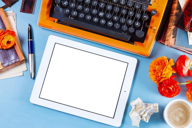 Workspace with vintage orange typewriter