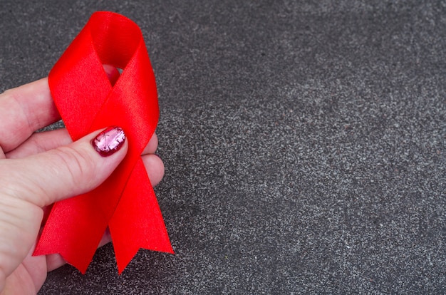 World AIDS Day with red ribbon