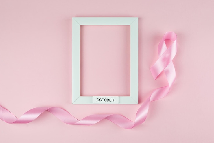 World Breast Cancer Day Pink ribbon white frame on pink background